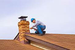 Brick Mason doing chimney repair in Lexington, SC
