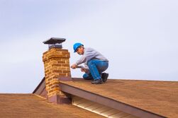 Brick Mason completing chimney repair in Columbia, SC
